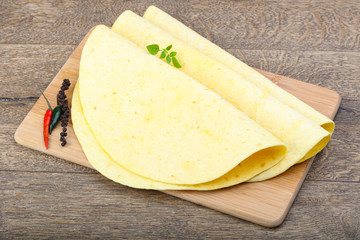 Tortilla on the wood background