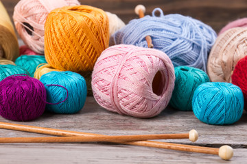 Fototapeta na wymiar Wooden crochet hooks and yarn.