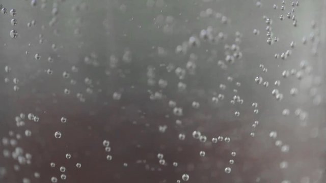 fizzy drink or bubbles floating up in water