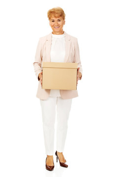 Smile Elderly Business Woman Holding Cardboard Box