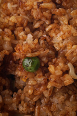 Chinese food. Rice with vegetables in soya sauce