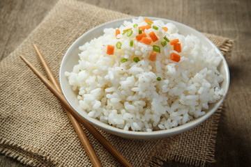 Japan rice with chopsticks on sack