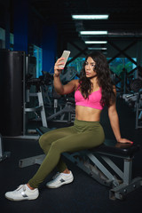 Fototapeta na wymiar Woman take selfie after workout
