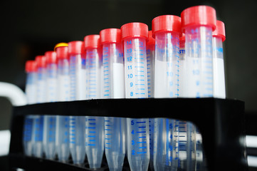 medical flask with blood red covers closeup