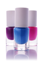 Blue, pink and violet nail polish