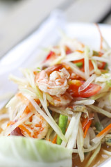 Stock Photo:.Green papaya salad (Som Tum) with shrimp