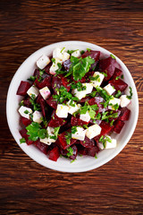 Healthy beetroot, feta cheese salad with parsley
