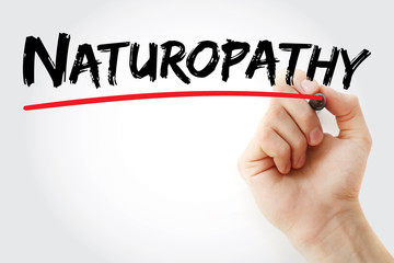 Hand writing Naturopathy with marker, concept background