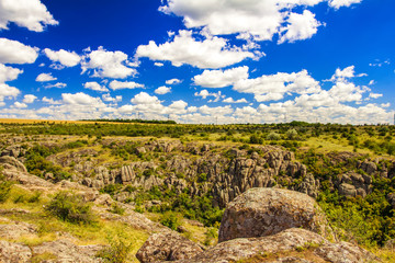 Aktovsky canyon, Ukraine, rocks, blue sky and clouds