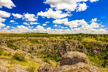 Foto op Canvas Aktovsky canyon, Ukraine, rocks, blue sky and clouds © hanna_photo