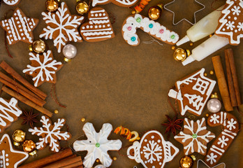 christmas cooking gingerbread frame with spices on cooking paper