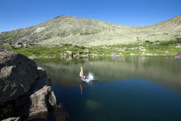 Fototapeta na wymiar Tale lake in the mountains of the Western Sayan