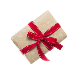 Gift box with red ribbon isolated on white