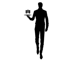 Elegant waiter with a tray. Silhouette of the elegant waiter in a dynamic pose with glasses.