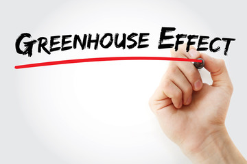 Hand writing Greenhouse effect with marker, concept background