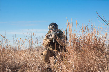 Soldiers on patrol during a outdoor military simulation Airsoft training game