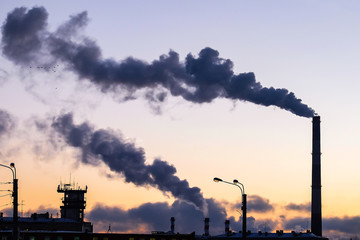 thick smoke belching from factory chimneys