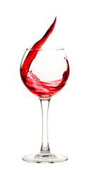 Splash of red wine in a glass goblet