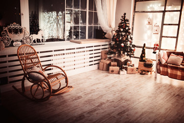 Perfect Christmas tree with decor and fireplace in living room