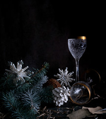 christmas, new year. basket with fir branches and vintage champagne glasses.