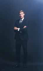 portrait of successful happy businessman in a gray business suit