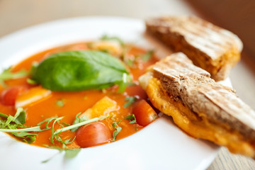 close up of gazpacho soup with bread at restaurant
