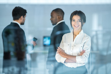 The business people stand over the window