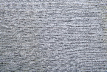 Handmade grey knitting wool texture background
