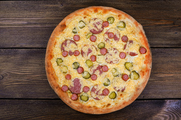 Delicious italian pizza served on wooden table