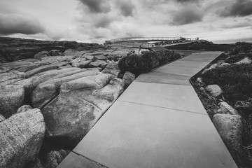 Footpath to the Gap a stone formation in Torndirrup National Park Albany Western Australia. Black...