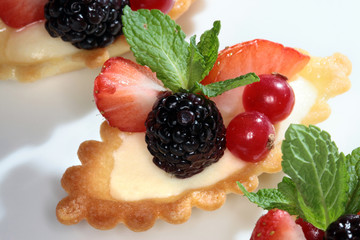 cake with strawberries and blackberries