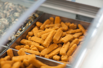 crab sticks on a counter in supermarket