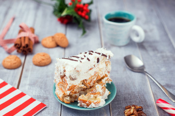 Homemade cake with Cookies on the wooden background