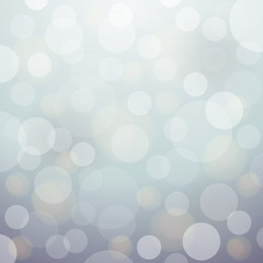 Glowing silver bokeh background with soft light for christmas de