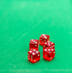 dice on a green background