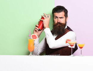serious handsome bearded barman - obrazy, fototapety, plakaty