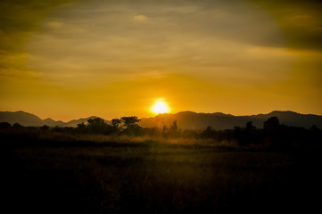 grass field outdoor sunset by countryside for background