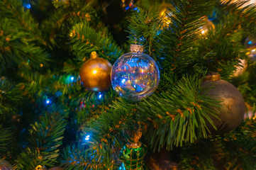 illumination on the Christmas tree. Dressed Christmas tree for the new year. Christmas decorations. background..selective focus