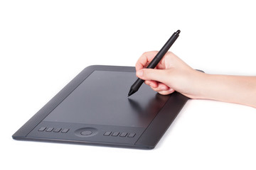 Hand is drawing on a digital graphic tablet 