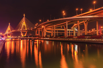 bhumibol bridge at night in thailand