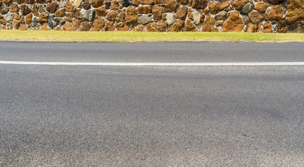 Asphalt road the at little coastal town of Myalup near Bunbury Western Australia .