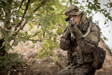 Obraz premium Sniper aiming from weapon
