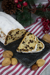 Christmas stollen. Traditional German dessert. Homemade. Rustic style.