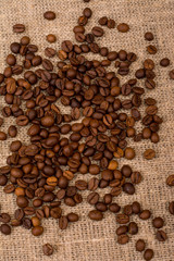 Coffee beans on sackcloth fabric