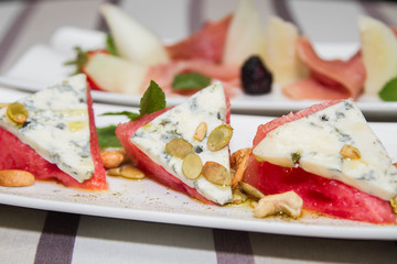 Summer salad. Melon, bacon, strawberries, blackberries, mint. Melon, blue cheese, walnut.