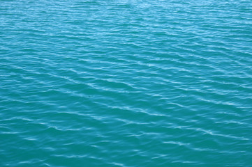 Blue sea surface with waves