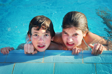 kids in open air swimming pool