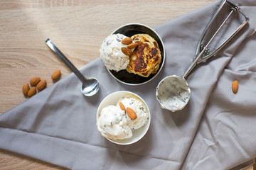 homemade ice cream with a spoon, and sweet cheese cake dessert