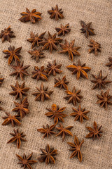 Star anise on sackcloth fabric