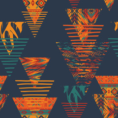 Fototapeta na wymiar Tribal ethnic seamless pattern with geometric elements.